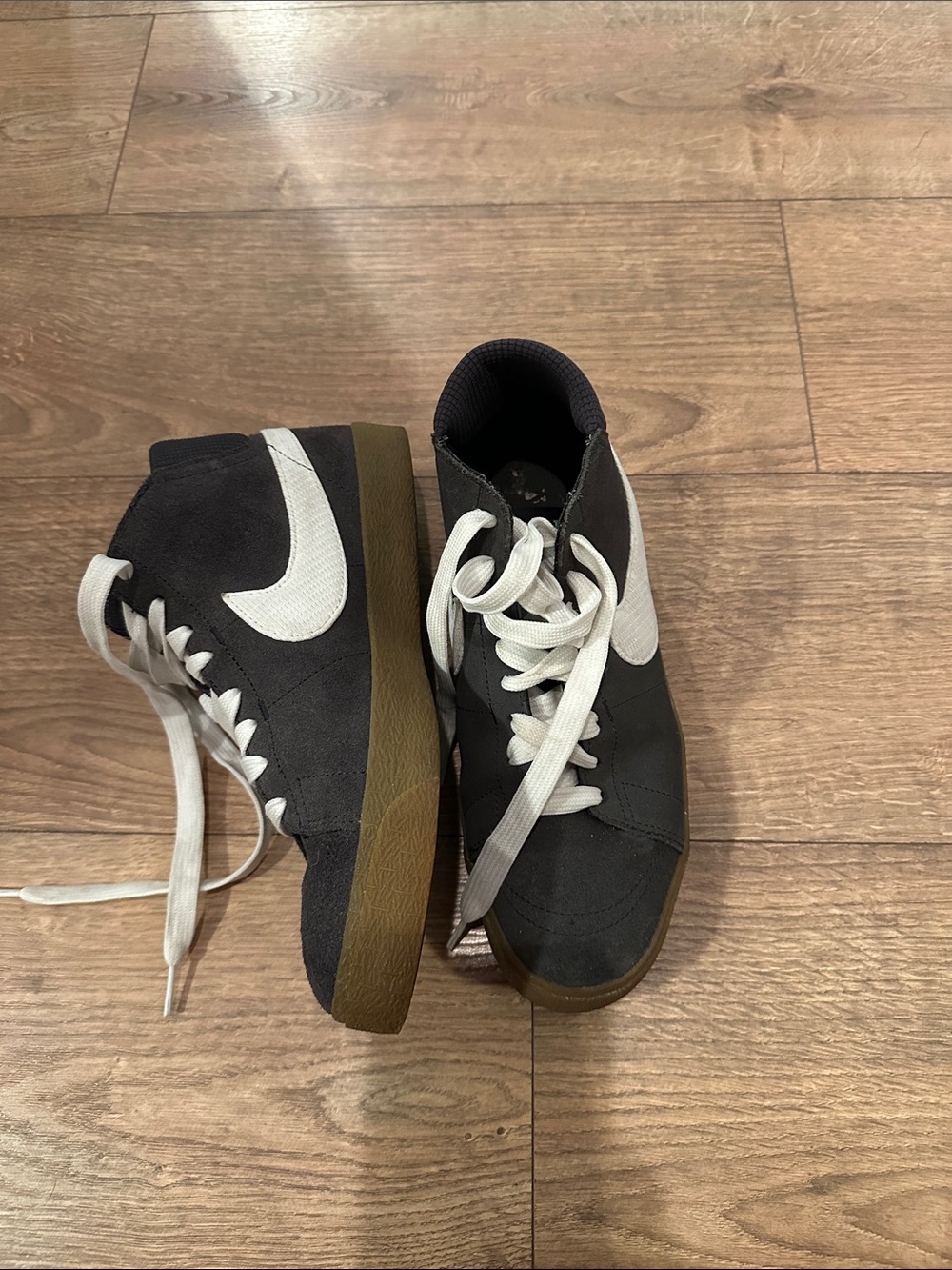 Nike Black Suede High-Top Sneakers with White Swoosh and Gum Sole
